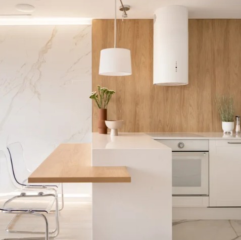 Kitchen remodeling project with updated cabinets and finishes